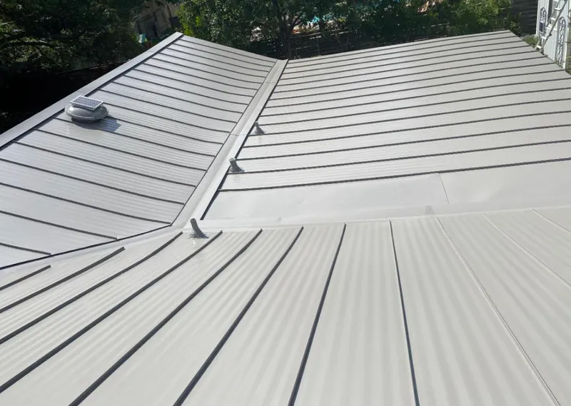 Solar attic fan installed on a metal roof for Roof Ventilation in San Marino